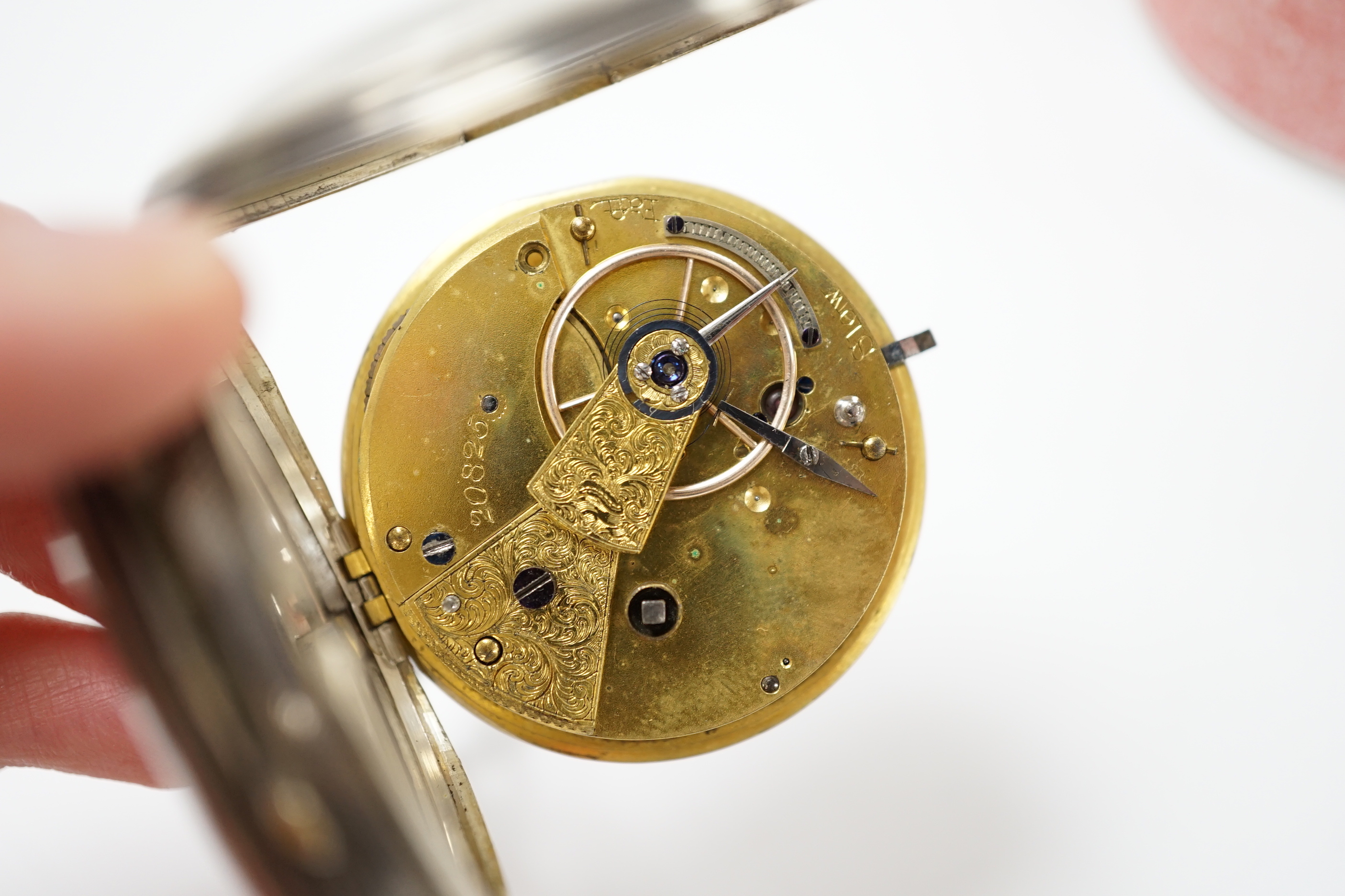 A 1920's silver open face pocket watch and a gold plated hunter pocket watch.